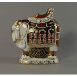 The Harrods 1999 Elephant, a  Royal Crown Derby model of an elephant, moulded standing with a saddle