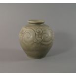 A Royal Lancastrian squat vase, 20th century, moulded with a band of stylised scrolls, impressed