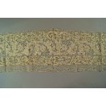 A collection of various lace to include panels and braid. (lot)

.