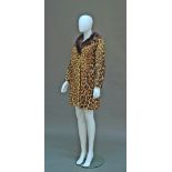 A leopard skin coat (panthera pardus) purchased before 1944, with mink collar and front slit