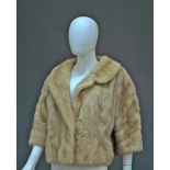 A palomino mink cropped jacket, with wide collar and lapels and single front concealed clasp, approx