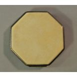 An Art Deco ivory and gilt white metal powder compact, of octagonal form, the inner cover with