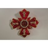 Chanel: A Chanel Gripoix ruby poured glass and crystal brooch, in the form of a Maltese cross,