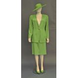 A Jacques Vert bright apple green skirt and jacket suit, 1980s, the collarless jacket with single