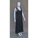 A 1930s black lace sleeveless cocktail dress and short lace jacket, together with a collection of