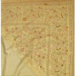 A 19th century Turkish bed cover fragment, worked in pastel silks on an ivory silk ground,