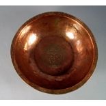 RTO An Islamic copper footed bowl of deep form, 18th/ 19th Century,