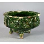 A Perisan green glazed earthenware footed bowl, 8th/9th Century,