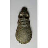 A Taino carved basalt adze with Zemi / S