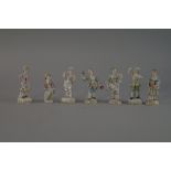 A selection of Continental porcelain figures, 19th century, dressed in floral clothes, most