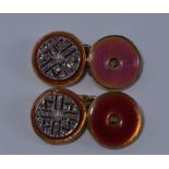 A pair of French gold, enamel and diamond set cufflinks, the pink enamel discs set to one side