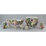 A Sizendorf porcelain jardiniere, late 19th/early 20th century, applied with naked cherubs draped