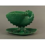 A Wedgwood green majolica tureen and stand, late 19th/early 20th, modelled in the form of a nautilus