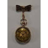 A 14ct gold ladies fob watch, the case with chased decoration, the gold face with floral chasing,