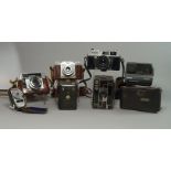 A Canon Canonet QL25 camera, with 45mm 1:25, lens and leather case, together with a large collection