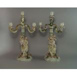 A pair of Sizzendorg candlesticks, late 19th/early 20th century, with matched four branch candelabra