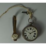 A silver open face pocket watch, Chester 1921, with white enamel dial, black Roman numerals and