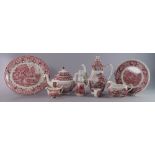 A collection of red printed pottery usef