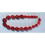 A Czech red glass trade bead necklace, 1