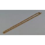A 15ct gold curb link chain, approx 50cm long, approx 45.5g CONDITION REPORT: Good overall