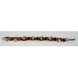 A 9ct gold, cultured pearl and citrine set bracelet,