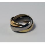 Cartier: A Trinity tri-colour 18ct gold interlocking ring, singed Cartier, approx size M/N, approx