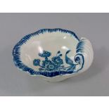 A Worcester blue and white porcelain moulded shell dish, 18th century, with moulded naturalistic