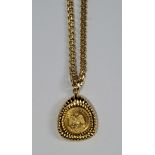 A Mexican two Pesos gold coin, 1945, in 15ct gold mount, on a 15ct gold chain, approx 15g gross.