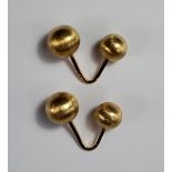 A pair of 18ct gold gentleman's cufflinks, of textured double ball and V-shape bar configuration,