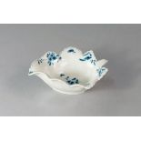 A Worcester blue and white porcelain leaf form dish, 18th century, with veins moulded to the body,