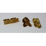 A pair of Chinese 14ct gold gentlemen's cufflinks, formed of seven open bars and applied Chinese