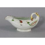 A Worcester sauce boat, circa 1754-56,  the body moulded in the form of lettuce leaves, with a