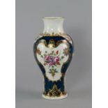 A Worcester porcelain vase, mid 18th century, of baluster form, painted and gilt with panels of