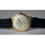 A 9ct gold cased Longines gentleman's wrist watch, 1972, silvered dial with gold batons and