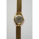 A Jaeger LeCoultre 18ct gold cased gentleman's manual wrist watch, with silvered dial, gold batons