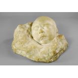 Clare Sheridan, British 1885-1970- Head of a child; plaster, signed to the underside, 27cm wide, (