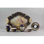 A Sevres porcelain part cabaret set, 19th century, painted with reserves of courting couples in