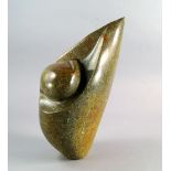 Miguel Kennedy, Zimbabwean b.1964- "Looking Forward"; serpentine marble, 34cm high CONDITION REPORT: