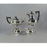 A silver four piece tea service, Sheffield 1966, Viner's Ltd, comprising teapot, coffee pot, milk