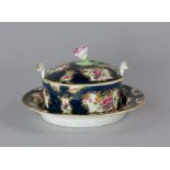 A Worcester porcelain butter tub, stand and cover, 18th century,  the lid with foliate finial, the