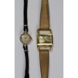 An 18ct gold cased Jaeger -LeCoultre ladies wrist watch, the rectangular case with exaggerated lugs,
