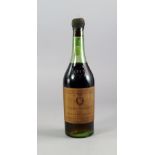 A bottle of Napoleon Grand Fine Champagne 1811 cognac, complete with good wax seal,