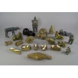 A group of Inuit works of art, 20th century, to comprise a collection of soapstone figures,