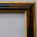 An Italian Polychrome and Parcel Gilded Bolection Frame, 17th century, with cavetto sight,