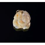 A Chinese white jade seal, in the form of a fish spraying water, 2.