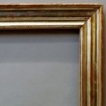 A French Silvered Charles X Moulding Frame, mid 19th century, with plain sight, ogee and top knull,