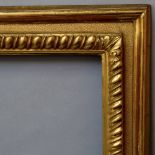 An Italian Carved and Gilded Cassetta frame, 17th century, with cavetto sight,