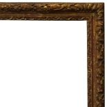 A Carved and Gilded Louis XIII Convex Frame, 17th century, with demi-fleur and hazzle sight, hollow,