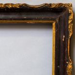 Two Near Matched Carved, Parcel Gilded and Ebonised Frames, 19th century, with cavetto sight, the