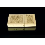 A Chinese carved ivory card case, 19th Century, of rectangular form,